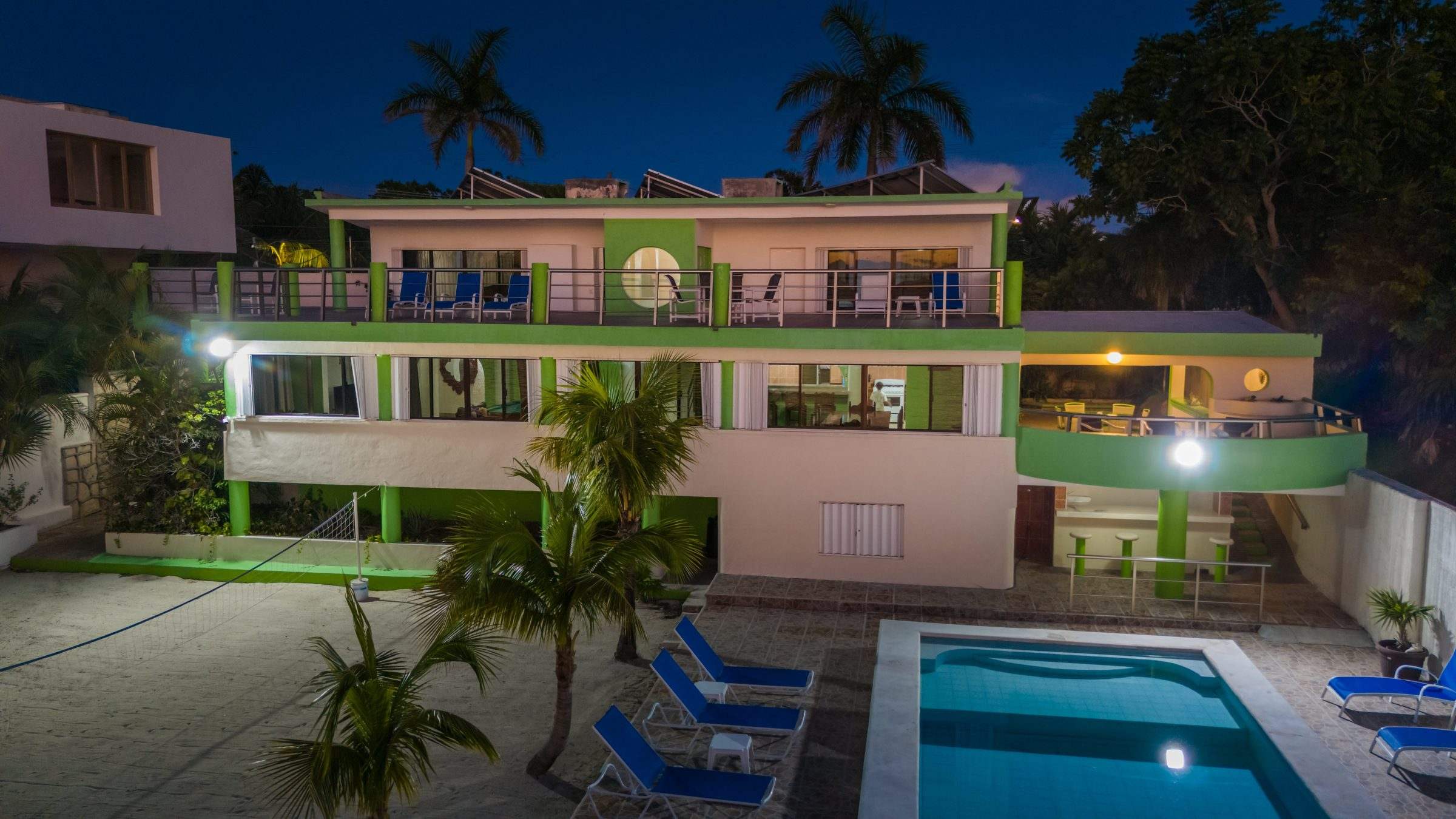 Las Iguanas at blue hour, the pool lit